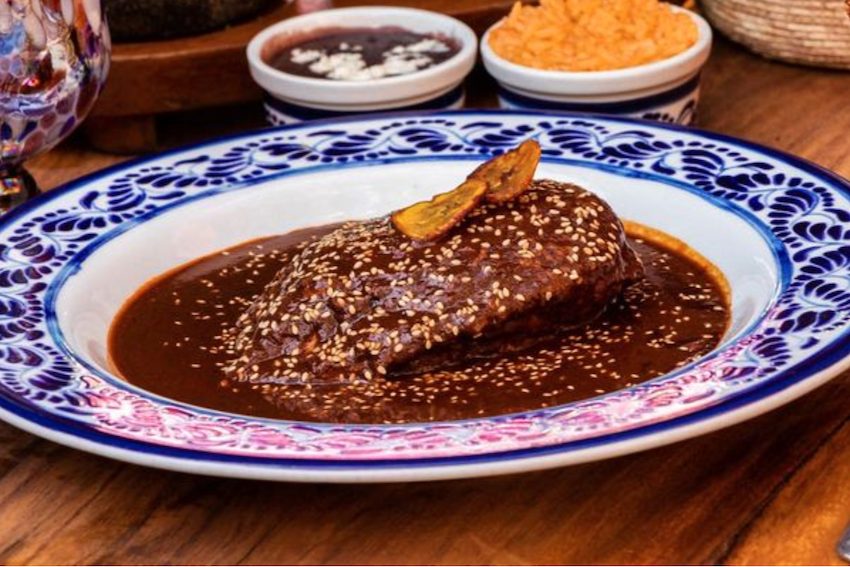 Chicken sauced with mole poblano.