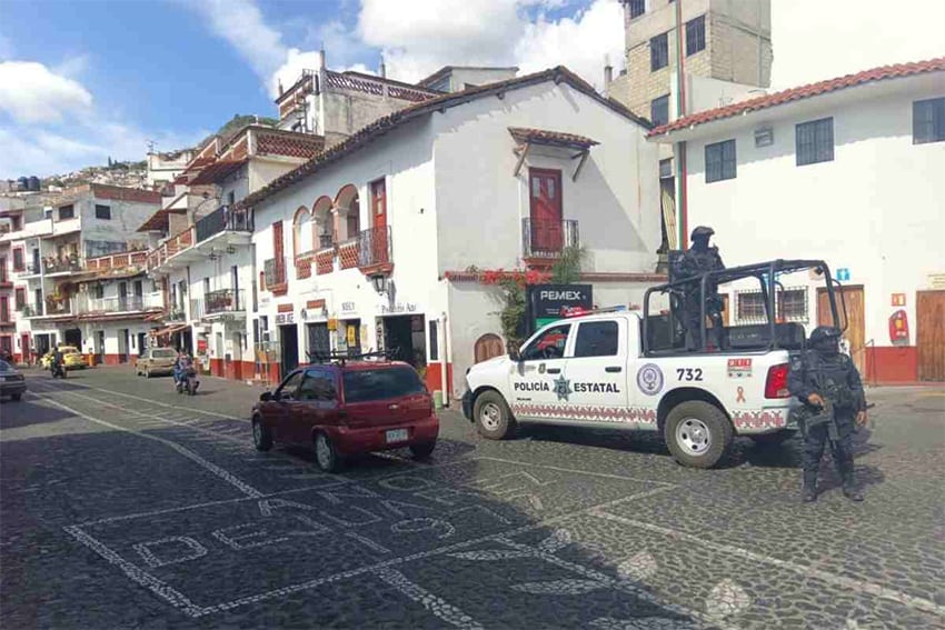 State police patrol the historic center of Taxco.